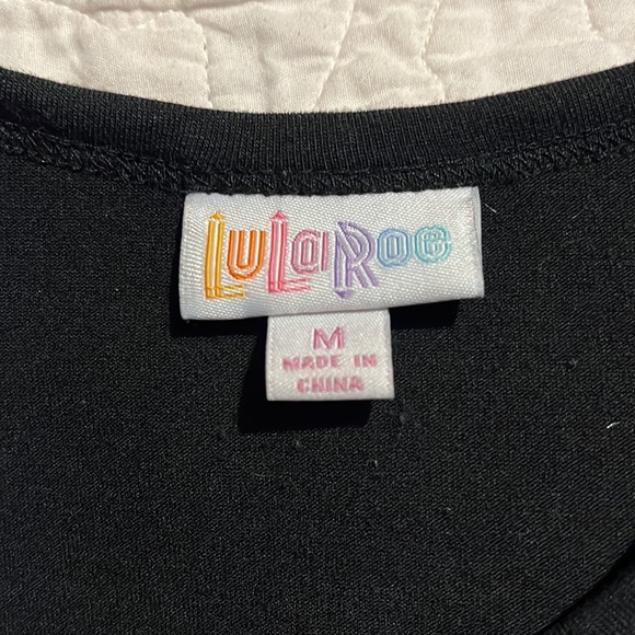 Medium mid length sleeve LuLaRoe Randy tee - Picture 3 of 4